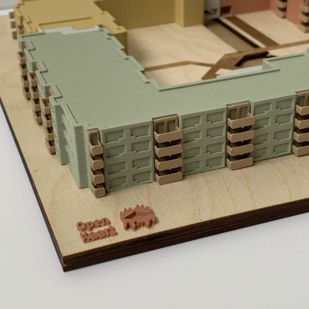 Maquette met kleuraccent per vleugel. Open Kaart
